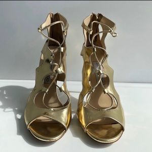 Beautiful Jimmy Choo gold sandals.